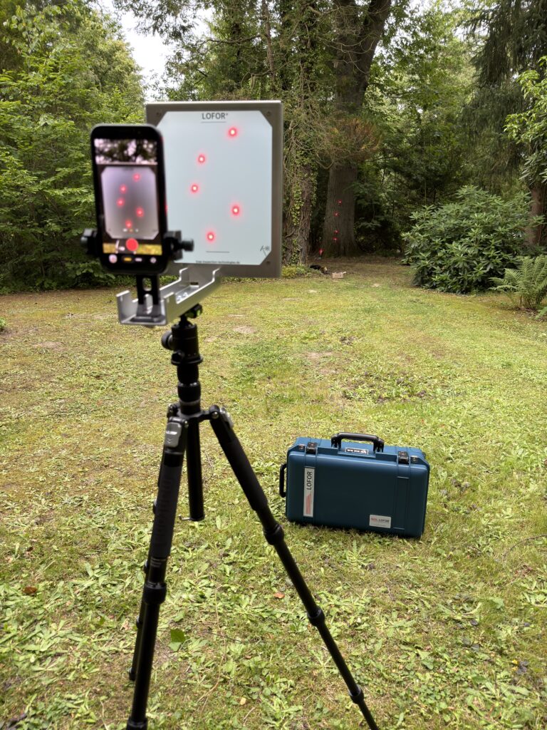 the lofor system being used, lasers are visible on the projection screen